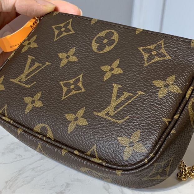 Louis vuitton origianl handmade monogram mini pochette accessoires M58009